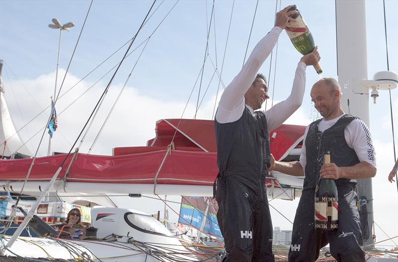 Erwan Le Roux and Giancarlo Pedote celebrate winning the Transat Jacques Vabre, Multi50 class photo copyright Jean Marie Liot taken at  and featuring the Multi 50 class