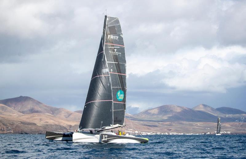 Start of the 2021 RORC Transatlantic Race from Puerto Calero, Lanzarote - Oren Nataf's Multi50 Trimaran Rayon Vert, skippered by Alex Pella - photo © James Mitchell / RORC