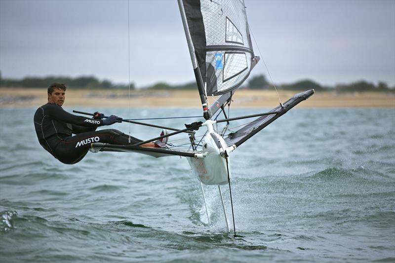 Rich Mason sailing his International Moth - photo © Musto