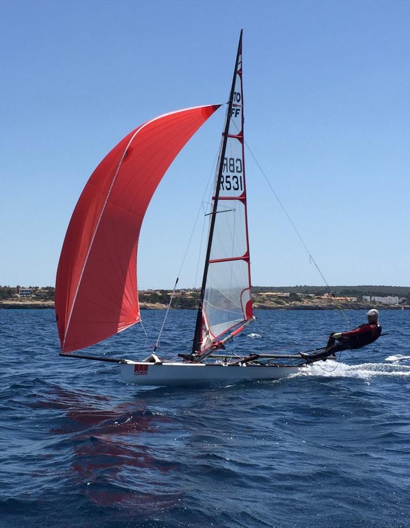 Flat out downwind during the Musto Skiff Training in Palma photo copyright Russ Clark taken at Club Nàutic S'Arenal and featuring the Musto Skiff class