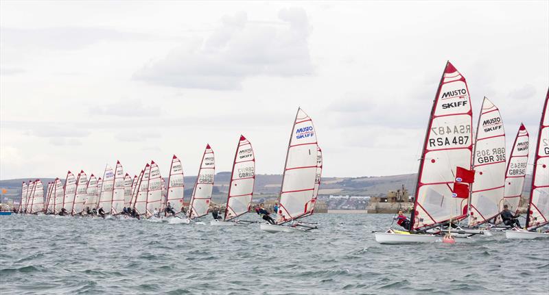 Musto Skiff UK Nationals at Castle Cove SC day 1 photo copyright Tim Olin / www.olinphoto.co.uk taken at Castle Cove Sailing Club and featuring the Musto Skiff class
