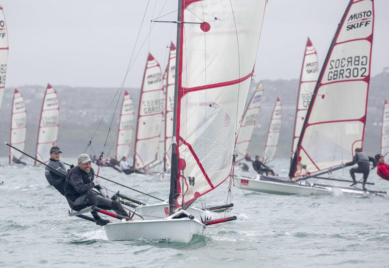 Musto Skiff UK Nationals at Castle Cove SC day 4 photo copyright Tim Olin / www.olinphoto.co.uk taken at Castle Cove Sailing Club and featuring the Musto Skiff class