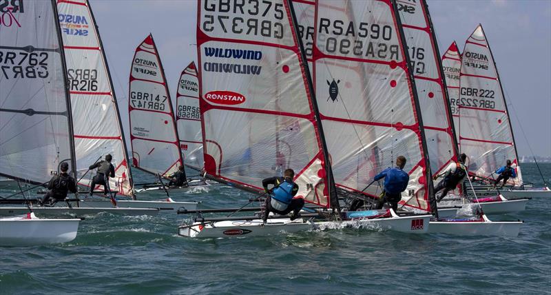 Racing in the Musto Skiff class during the Stokes Bay Skiff Open photo copyright Tim Olin / www.olinphoto.co.uk taken at Stokes Bay Sailing Club and featuring the Musto Skiff class