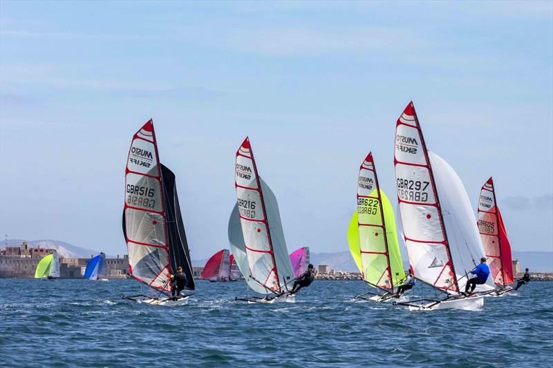 Musto Skiffs at the Weymouth Skiff Open 2022 photo copyright Tim Olin / www.olinphoto.co.uk taken at Weymouth & Portland Sailing Academy and featuring the Musto Skiff class
