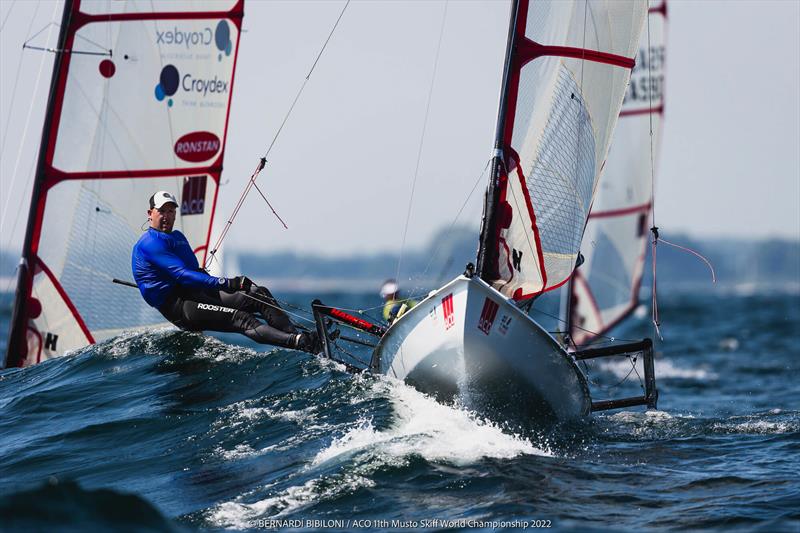 Jono Shelley on day 3 of the 11th ACO Musto Skiff World Championship at Kiel Week photo copyright Bernardí Bibiloni / www.bernardibibiloni.com taken at Kieler Yacht Club and featuring the Musto Skiff class