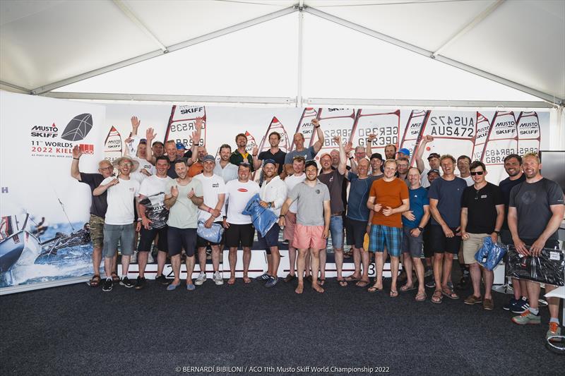 Class prize giving during the 11th ACO Musto Skiff World Championship at Kiel Week photo copyright Bernardí Bibiloni / www.bernardibibiloni.com taken at Kieler Yacht Club and featuring the Musto Skiff class