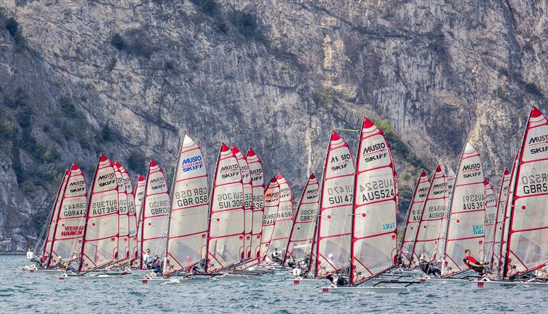 Heading up wind after the start during the 2015 Musto Skiff Worlds photo copyright Tim Olin / www.olinphoto.co.uk taken at Fraglia Vela Riva and featuring the Musto Skiff class