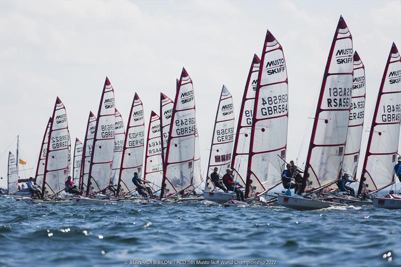 Musto Skiffs - 2022 Worlds photo copyright Bernardí Bibiloni / www.bernardibibiloni.com taken at Kieler Yacht Club and featuring the Musto Skiff class