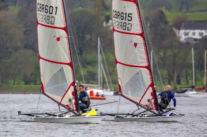 Mikey and Richard during the Musto Skiffs at the Ullswater Yacht Club Daffodil Regatta 2023 photo copyright Tim Olin / www.olinphoto.co.uk taken at Ullswater Yacht Club and featuring the Musto Skiff class