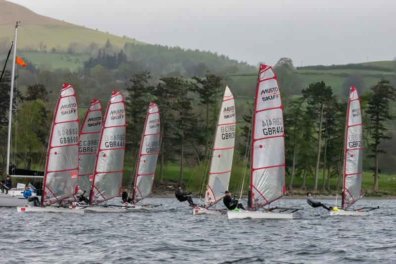 Race start for the Musto Skiff fleet during the Ullswater Daffodil Regatta 2025 - photo © Tim Olin / www.olinphoto.co.uk
