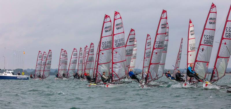 Start line - 2025 Noble Marine Musto Skiff UK Nationals, day 3 photo copyright Tim Olin / www.olinphoto.co.uk taken at Hayling Island Sailing Club and featuring the Musto Skiff class