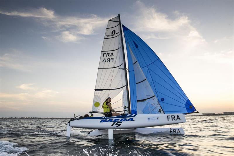 Day 4 of the Youth Sailing World Championships presented by Hempel photo copyright Lloyd Images / Oman Sail taken at Oman Sail and featuring the Nacra 15 class