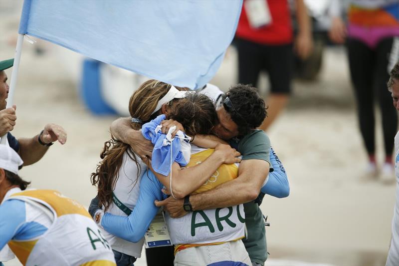 Cecilia Carranza Saroli enjoys the celebrations after winning gold in the Nacra 17 class at the Rio 2016 Olympic Sailing Competition - photo © Sailing Energy / World Sailing