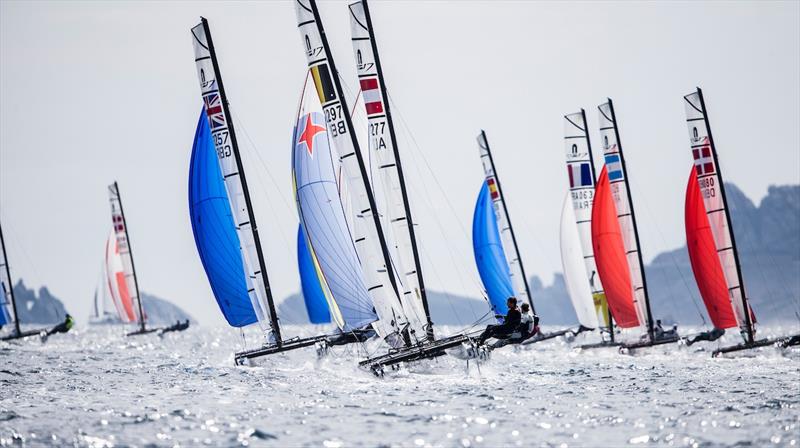 Nacra 17 fleet on day 2 at World Cup Hyères photo copyright Pedro Martinez / Sailing Energy / World Sailing taken at COYCH Hyeres and featuring the Nacra 17 class