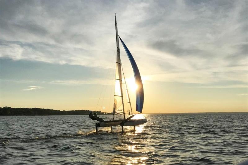 Acorns go full send at sunset - photo © Oakcliff Sailing