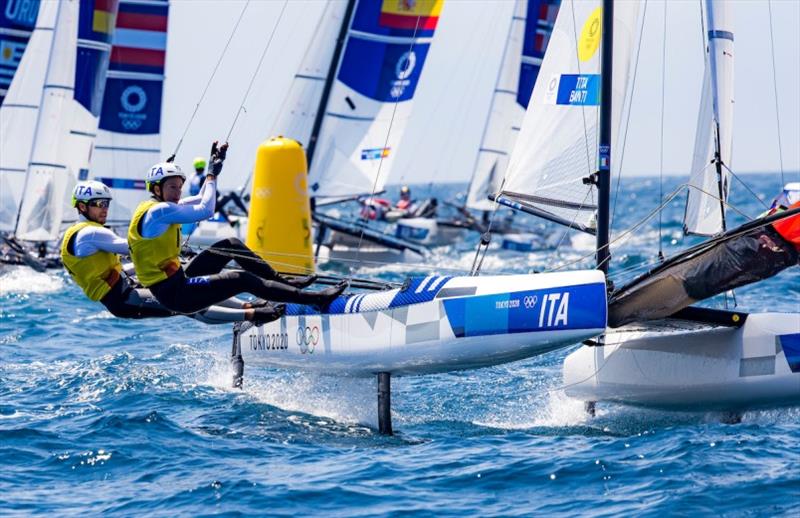 Ruggero Tita and Caterina Banti (ITA) leading around the weather mark. - photo © Sailing Energy / World Sailing