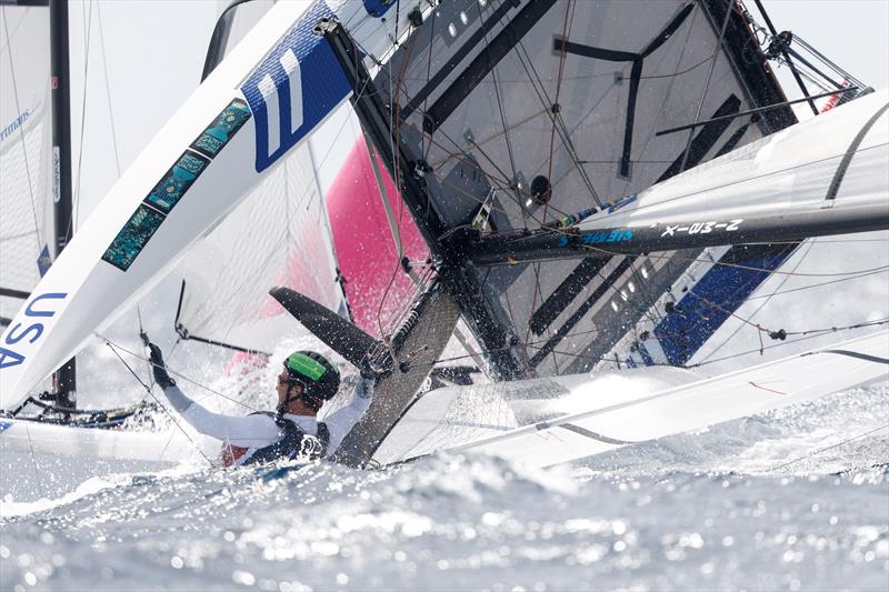  USA  in a bit of strife - Nacra 17 - Paris 2024 Olympic Sailing Test Event, Marseille, France - Day 3  - July 11, 2023 - photo © Mark Lloyd / World Sailing