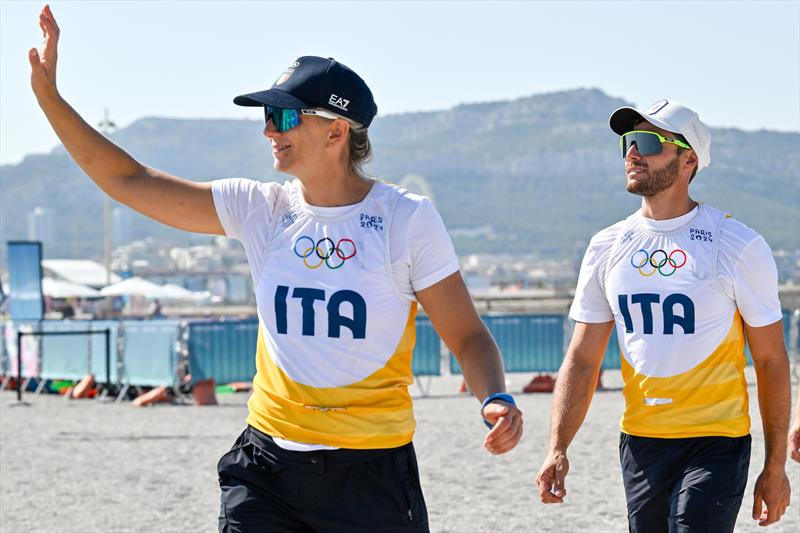 Ruggero Tita and Caterina Banti (ITA) ahead of the Mixed Multihull Medal Race at Paris2024 on August 8, 2024 in Marseille, France photo copyright World Sailing / Jean-Louis Carli taken at  and featuring the Nacra 17 class