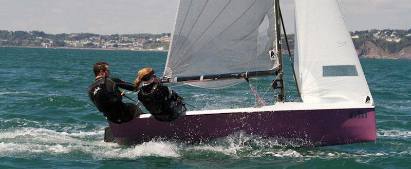 Helm and crew sat well back, with winged rudder adjusted so the bow is clearing the waves  - photo © Gareth Fudge / www.boatographic.co.uk