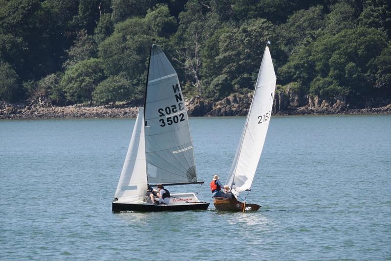 The vintage boat of Angus Beyts and Phil Wherry ducks under the stern of eventual winners, Tim and Chris Hampshire holding their course on starboard - National 12 open at Solway - photo © Margaret Purkis