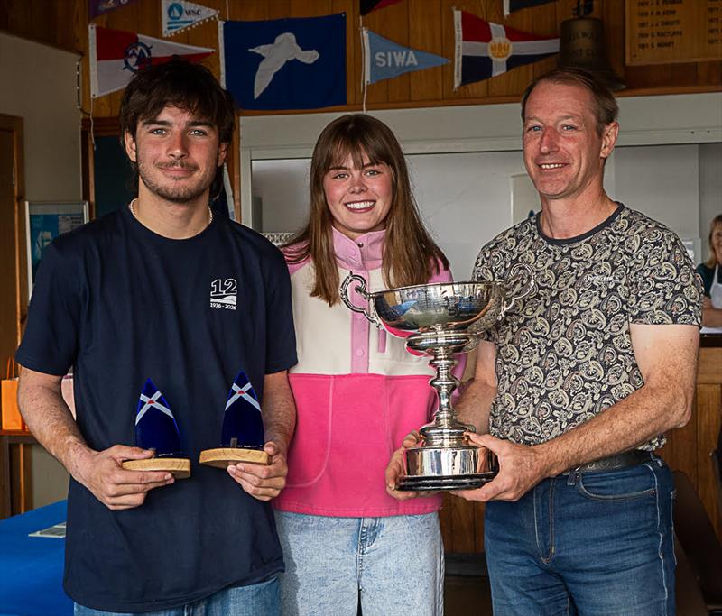 Chris and Tim Hampshire presented with the Scottish Daily Express Trophy by PRO, Sally Mackay in the Scottish National 12 Championship at Solway Yacht Club photo copyright Margaret Purkis taken at Solway Yacht Club and featuring the National 12 class