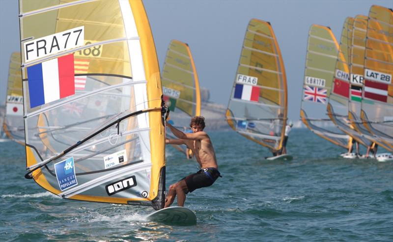 Pierre Le Coq FRA (RSX) on day 2 of the ISAF Sailing World Championship photo copyright Vincenzo Baglione taken at  and featuring the RS:X class