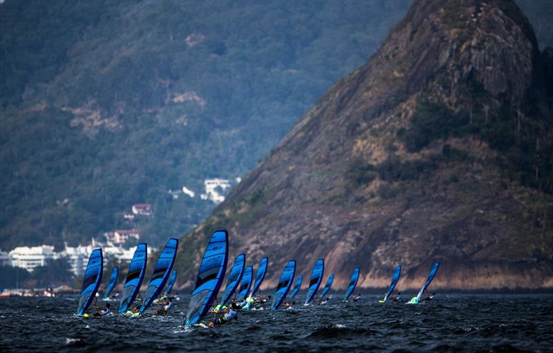 The Men's RS:X fleet head left upwind on Day 1 of the Rio 2016 Olympic Sailing Regatta - photo © Sailing Energy / World Sailing