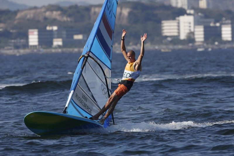 Dorian van Rijsselberge celebrates gold in the Men's RS:X class at the Rio 2016 Olympic Sailing Competition photo copyright Richard Langdon / British Sailing Team taken at  and featuring the RS:X class