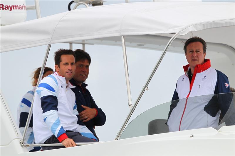 David Cameron. Ben Ainslie and Andrew Simpson watchng the RS:X Medal Races at the London 2012 Olympic Sailing Competition photo copyright Richard Langdon / Ocean Images taken at Weymouth & Portland Sailing Academy and featuring the RS:X class