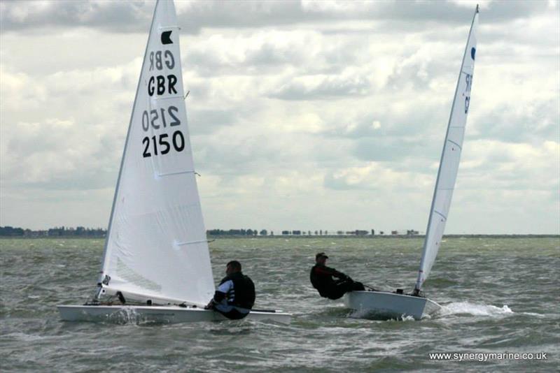 Couch leads Cumbley during the International OK Dinghy UK Nationals at Dabchicks day 4 photo copyright Simon Cox / www.synergymarine.co.uk taken at Dabchicks Sailing Club and featuring the OK class