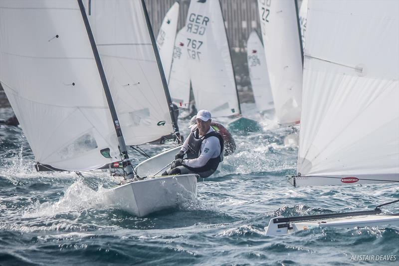 Racing on day 3 of the 2017 OK Dinghy Worlds photo copyright Alastair Deaves taken at Barbados Yacht Club and featuring the OK class