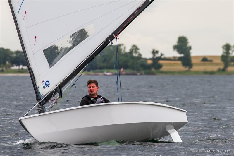 Luke Gower on day 2 of the OK Dinghy European Championship photo copyright Robert Deaves taken at  and featuring the OK class