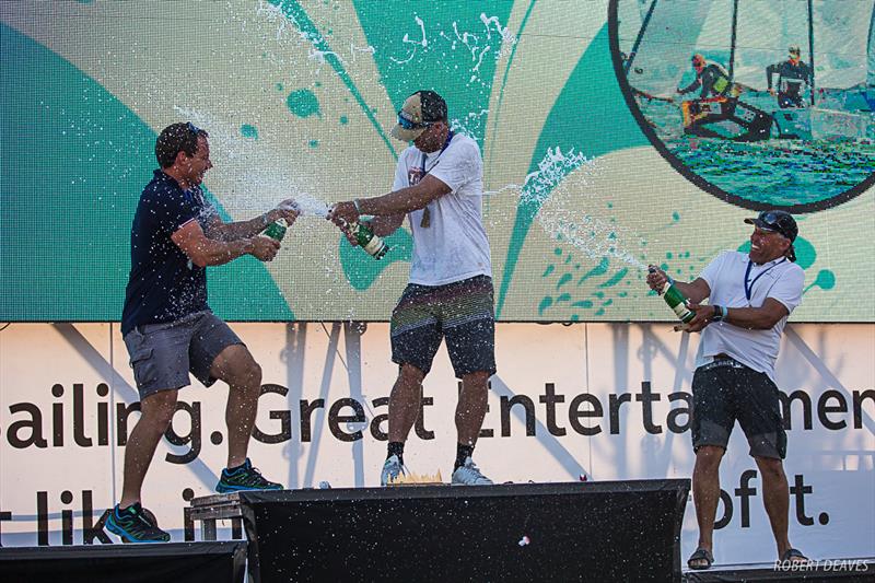 Champagne fun during the OK Dinghy European Championship in Kiel, Germany photo copyright Robert Deaves taken at Kieler Yacht Club and featuring the OK class