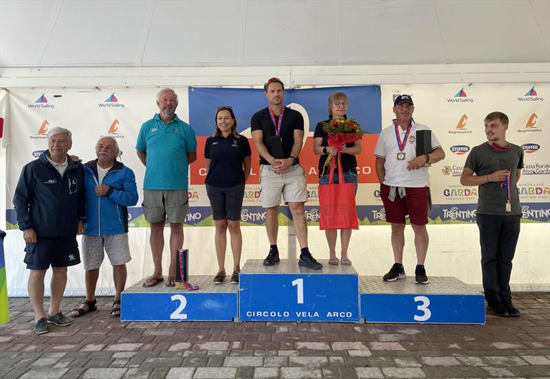 Prizewinners with Race Committee at the 2021 OK Dinghy International Regatta photo copyright Emilio Santinelli / Circolo Vela Arco taken at Circolo Vela Arco and featuring the OK class