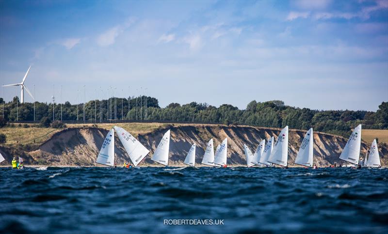 Downwind Race 1 in the OK class on day 2 of Kieler Woche 2021 photo copyright Robert Deaves / www.robertdeaves.uk taken at Kieler Yacht Club and featuring the OK class