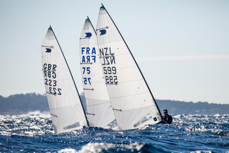 Close battle for Craig, Hay and Wilcox in Race 3 on day 3 of the OK Dinghy Autumn Trophy 2021 photo copyright Robert Deaves taken at Société Nautique de Bandol and featuring the OK class
