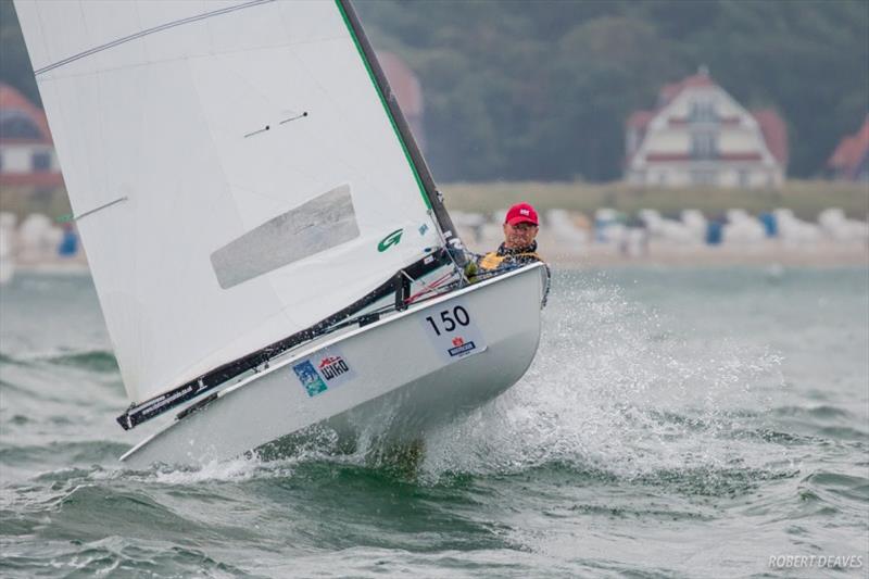 Ingo Ballerstein finds a large wave during the Pre-Worlds photo copyright Robert Deaves taken at  and featuring the OK class
