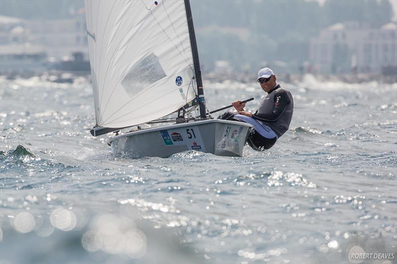 Andre Budzien on day 4 of the OK Dinghy World Championship photo copyright Robert Deaves taken at  and featuring the OK class