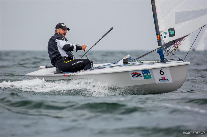 Jonas Borjesson on day 4 of the OK Dinghy World Championship photo copyright Robert Deaves taken at  and featuring the OK class