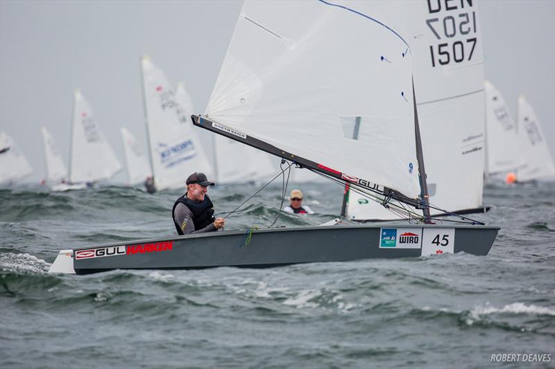 Charlie Cumbley on day 4 of the OK Dinghy World Championship photo copyright Robert Deaves taken at  and featuring the OK class