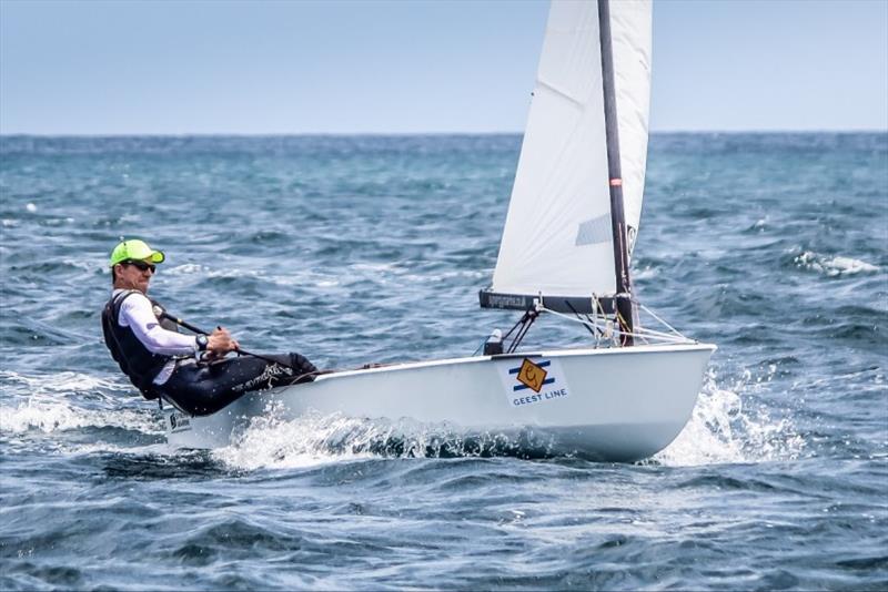 Nick Craig won a record fifth title in 2017 OK Dinghy World Championship in Barbados photo copyright Robert Deaves taken at  and featuring the OK class