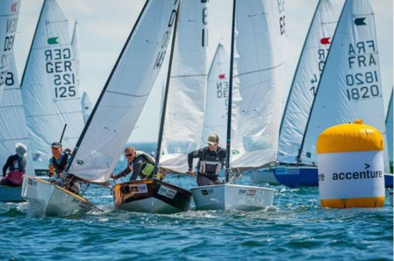 Close battles at the windward mark during the first race of OK European Championship.  - photo © Kiel Week / Sascha Klahn