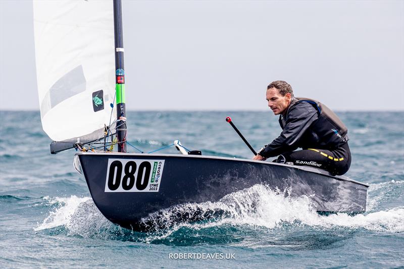 OK Dinghy Worlds Day 2 - Valerian Lebrun, FRA photo copyright Robert Deaves / www.robertdeaves.uk taken at Lyme Regis Sailing Club and featuring the OK class