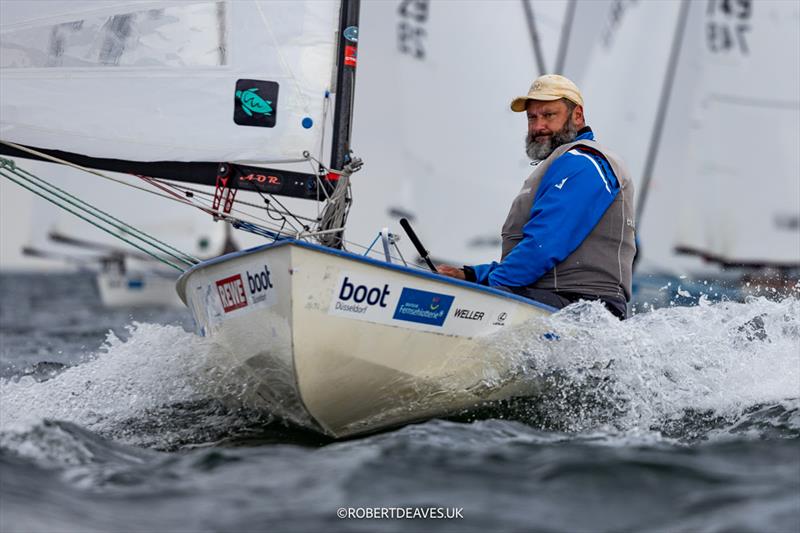 Jörg Rademacher, GER in the OK Dinghy class at Kieler Woche photo copyright Robert Deaves / www.robertdeaves.uk taken at Kieler Yacht Club and featuring the OK class
