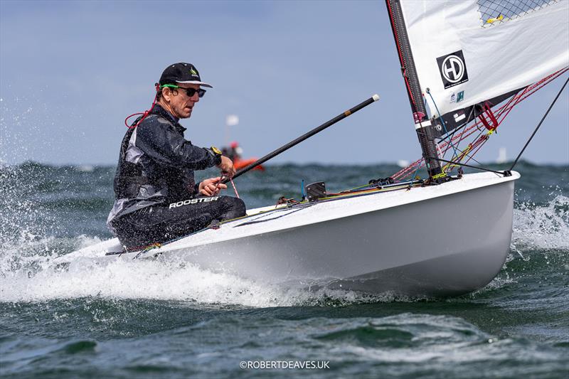 Nick Craig, GBR on day 3 of the OK Dinghy Europeans at Warnemünde photo copyright Robert Deaves / www.robertdeaves.uk taken at Warnemünder Segel-Club and featuring the OK class