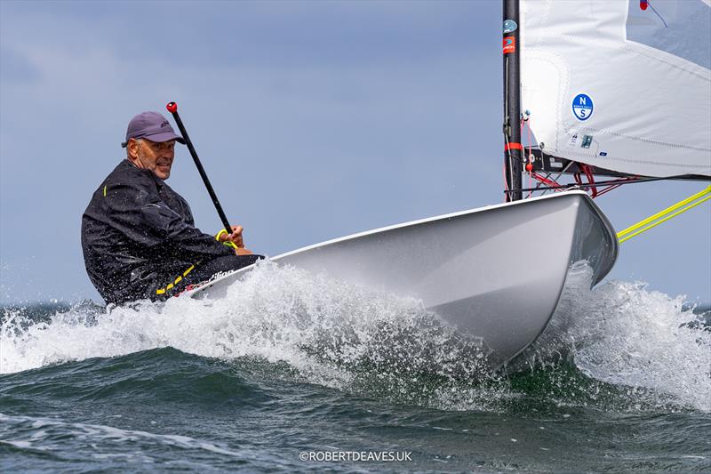 Andre Budzien, GER on day 3 of the OK Dinghy Europeans at Warnemünde photo copyright Robert Deaves / www.robertdeaves.uk taken at Warnemünder Segel-Club and featuring the OK class