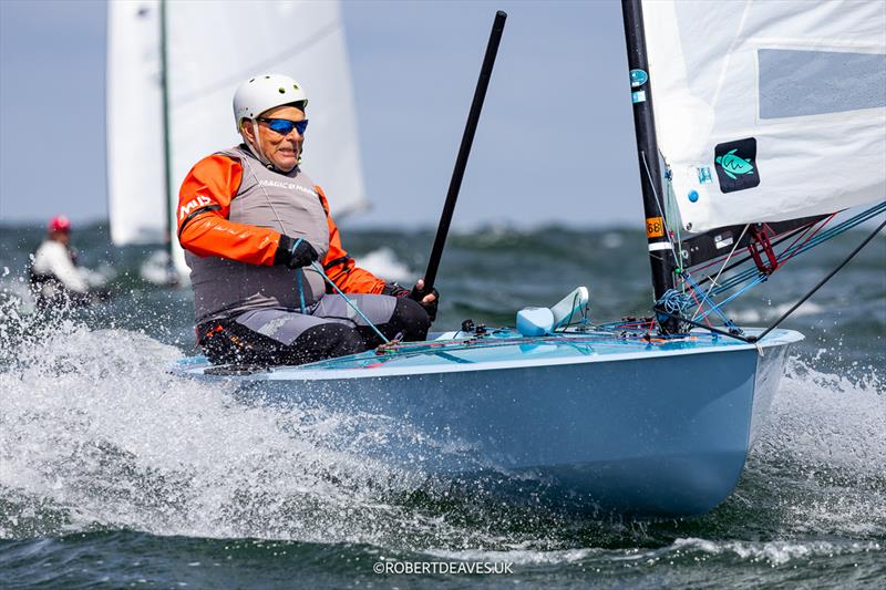 Christian Kirchner, GER on day 3 of the OK Dinghy Europeans at Warnemünde photo copyright Robert Deaves / www.robertdeaves.uk taken at Warnemünder Segel-Club and featuring the OK class