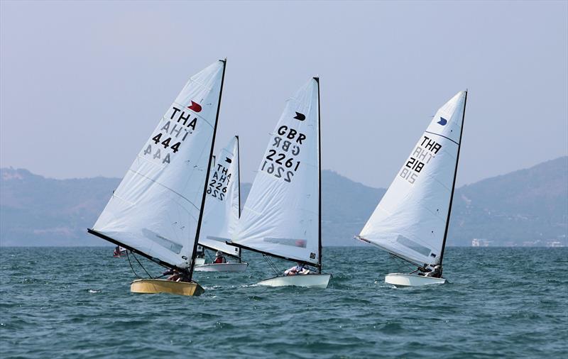 A trio of OKs side by side downwind on day 2 of the Open Masters Championship 2026 photo copyright Henry Weidmann taken at Royal Varuna Yacht Club and featuring the OK class