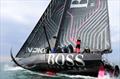 Alex Thomson brings Hugo Boss to Jersey © Debbie Brown