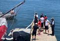 Initiatives Coeur, skipper Sam Davies(GBR), is pictured arriving in the harbour after having suffered major damages during the Vendée Globe race, in Cape Town, South Africa, on December 5, 2020